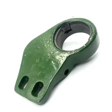 Корпус подшипника звездочки Z10017 жатки John Deere